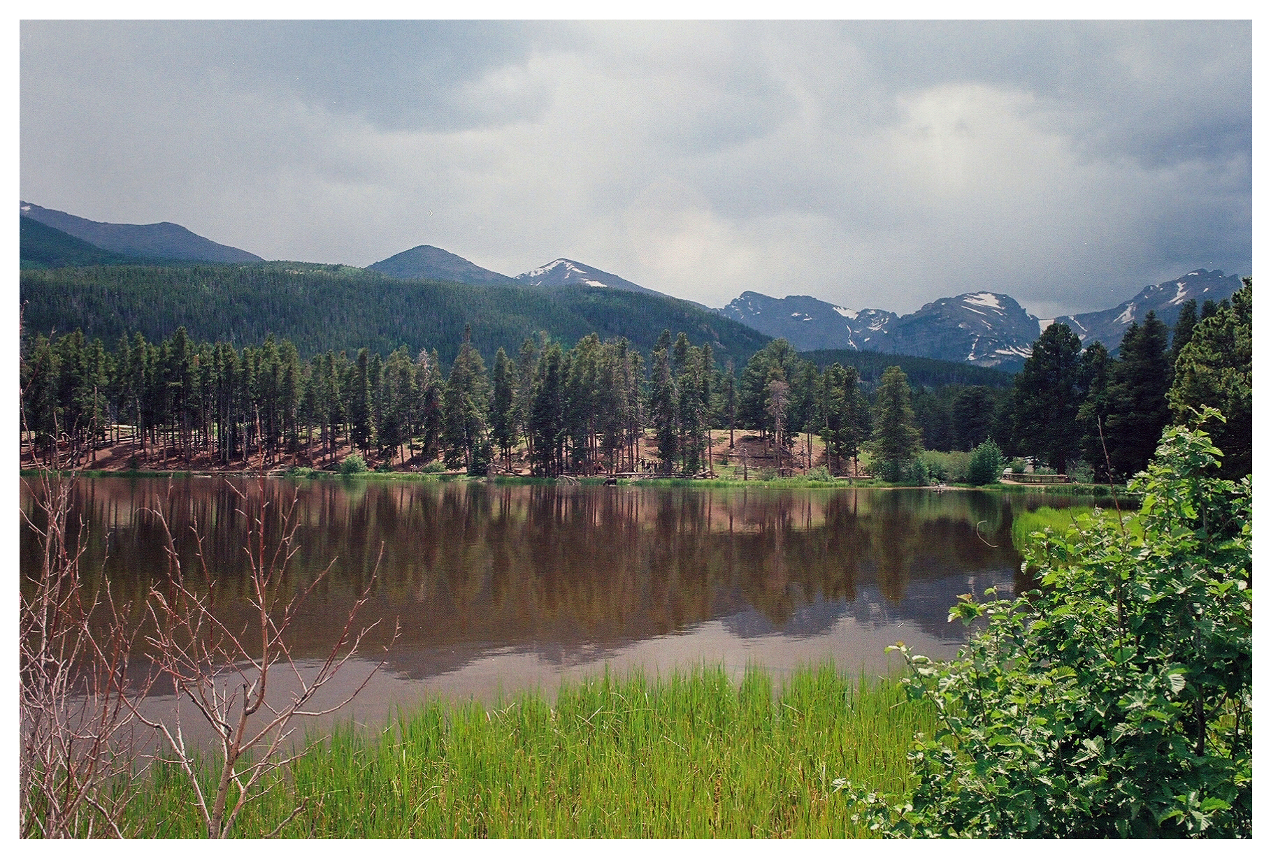 Mountain landscape reflected across water